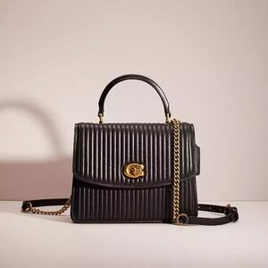 Coach Black Quilted Leather Bag with Gold Accents